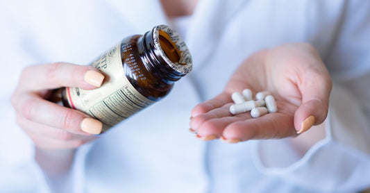A bottle of GABA supplement for anxiety on a clean white background, highlighting natural stress relief.