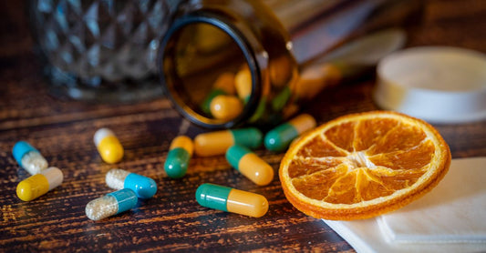 Assorted vitamin C supplement bottles and powder jars arranged on a clean white surface, representing the best vitamin C supplements 2026 in Australia.
