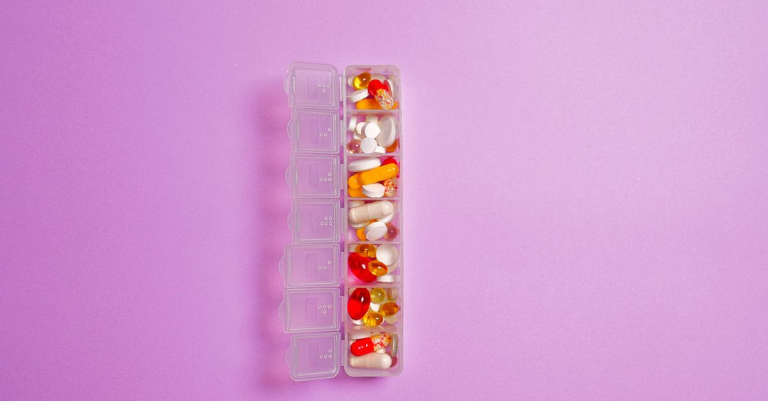 Colourful assortment of everyday vitamin and supplement capsules and tablets on a bright surface, representing best everyday vitamins & supplements 2026.