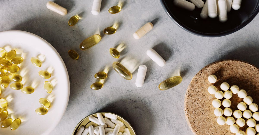 An array of everyday vitamins and supplements bottles arranged neatly on a clean surface, representing where to buy everyday vitamins & supplements online in Australia.