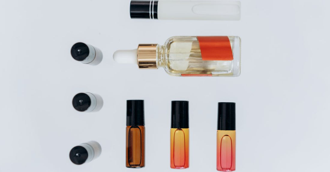 An assortment of everyday vitamin and supplement bottles arranged on a white background, illustrating how to choose everyday vitamins & supplements.