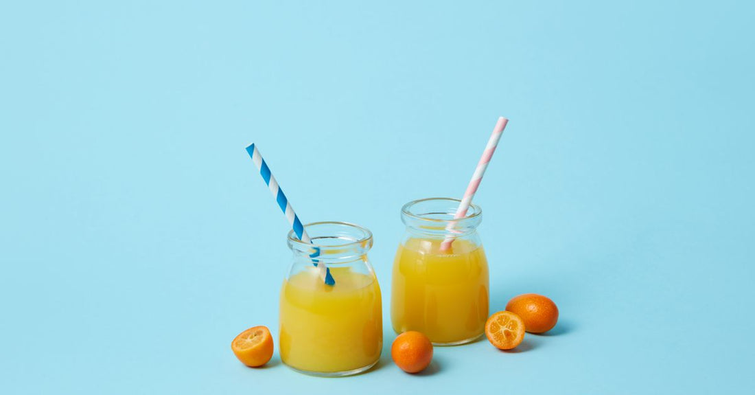 A glass jar of fine white vitamin C powder on a clean surface, representing the best form of vitamin C for absorption.