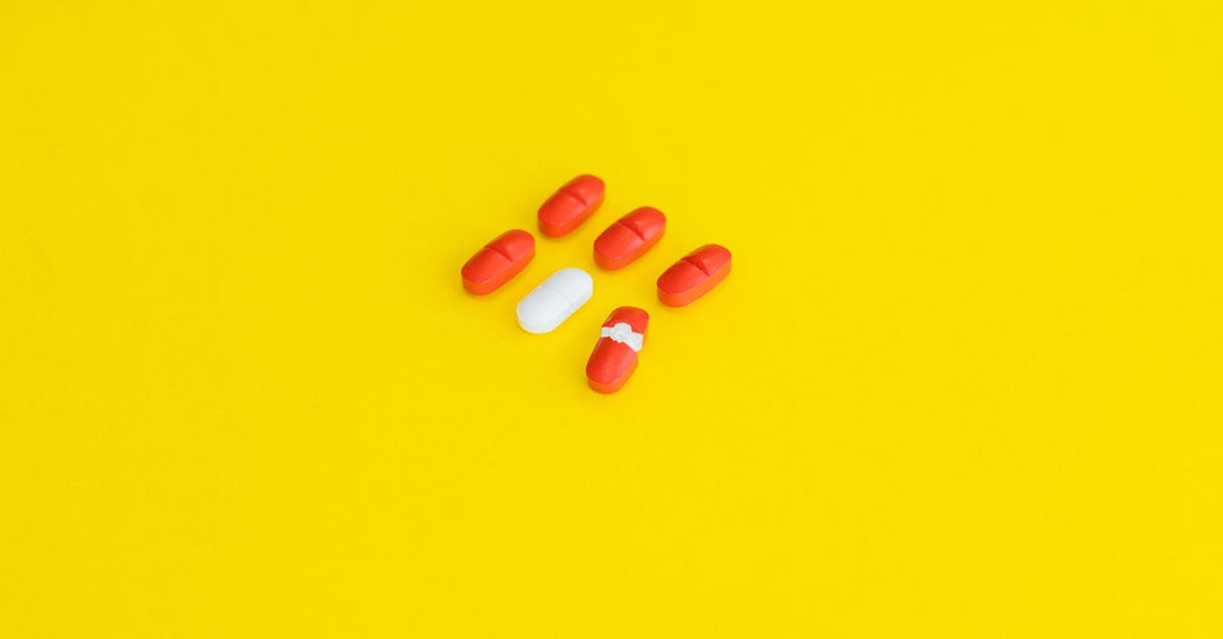 Assorted vitamin and supplement bottles arranged on a clean surface, representing an everyday vitamins & supplements buying guide for Australians.